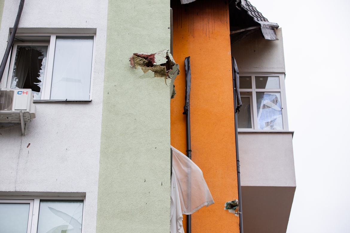 Irpin, Ukraine During the Russian Invasion Tank round or high caliber round through the corner of the building